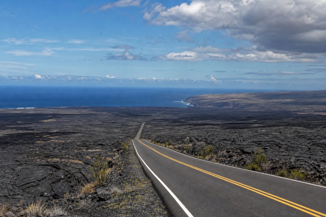 Chain of Craters Road crossing the lava plain on its way down to the sea