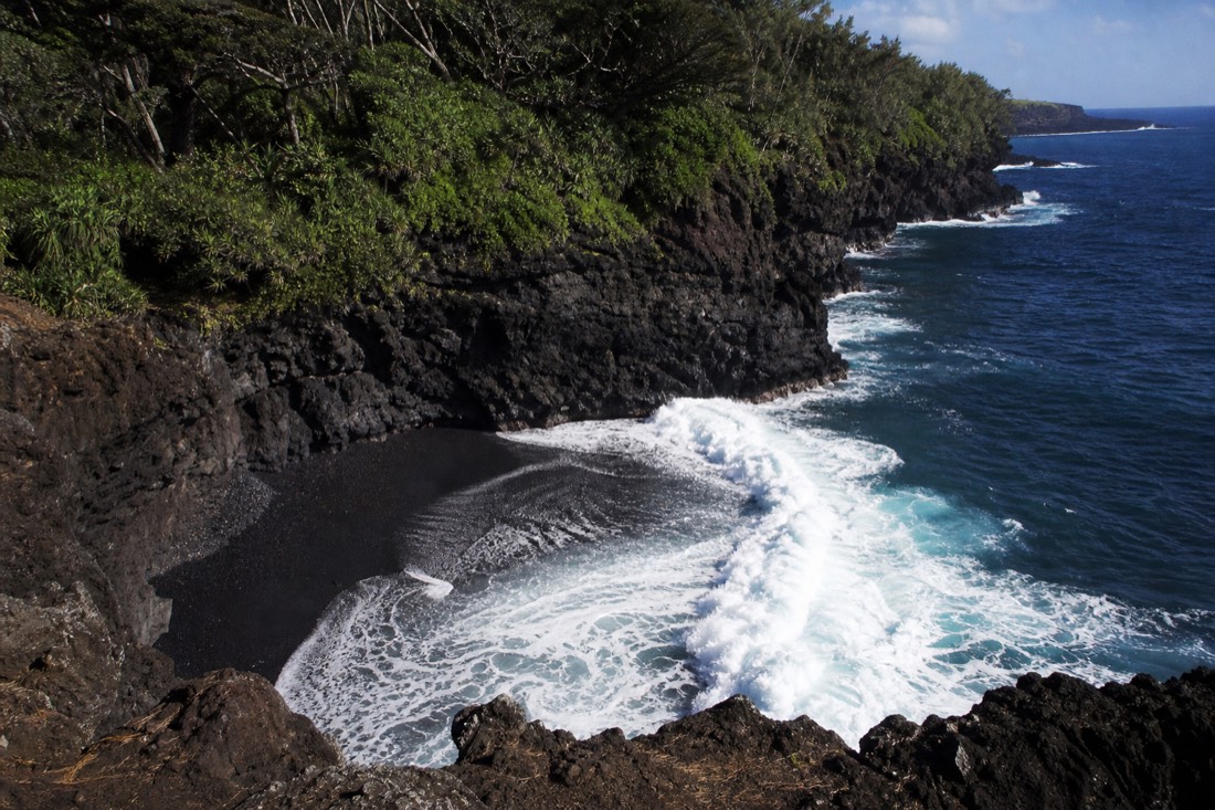 Kehena, a smaller black sand cove along the same lava coastline