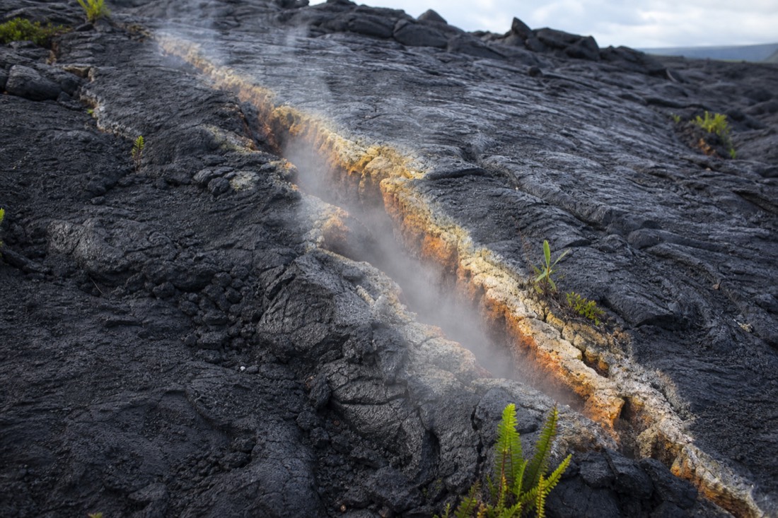 Steam still seeping from a crack in the crater floor decades after the eruption