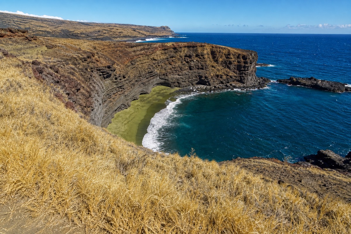 Papakōlea Green Sand Beach seen from the rim of the eroded cinder cone that surrounds it