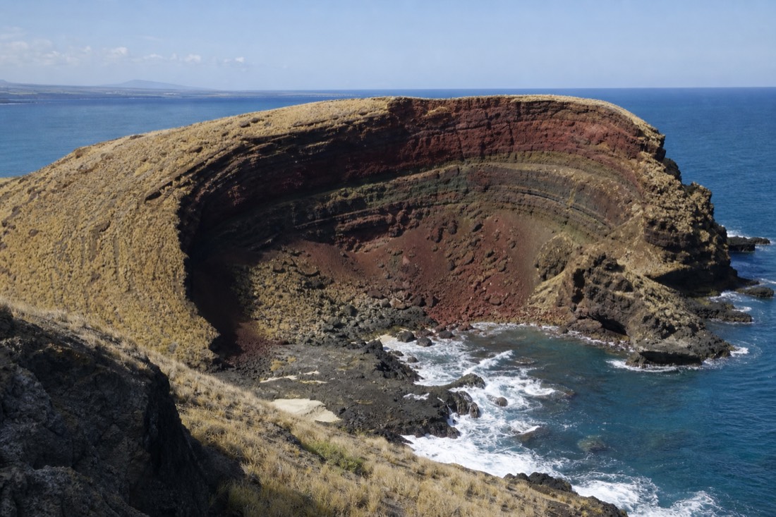 Puʻu Mahana, the eroding cinder cone that is the source of Papakōlea's green sand